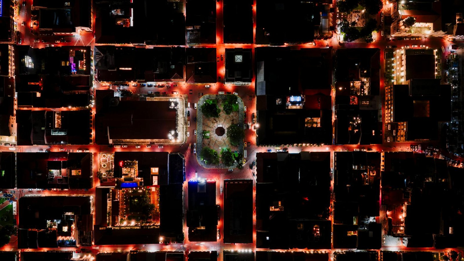 Stunning aerial view of Panama City's illuminated streets at night.