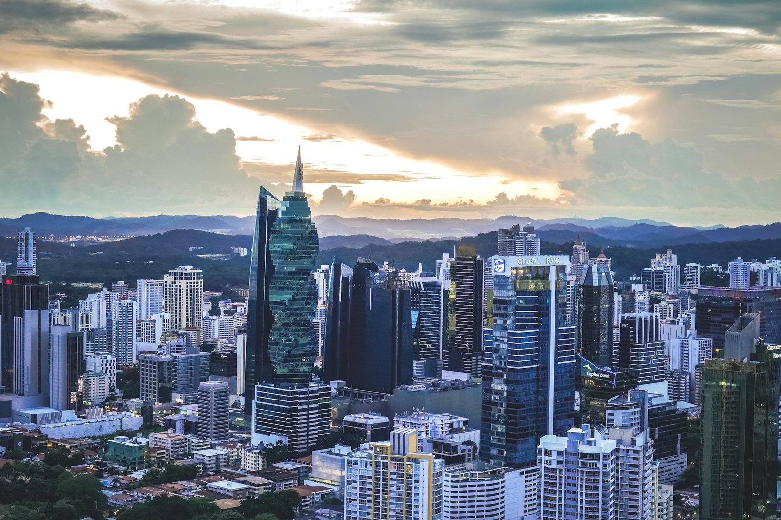 Stunning view of Panama City skyline at sunset, showcasing its modern architecture and iconic skyscrapers.